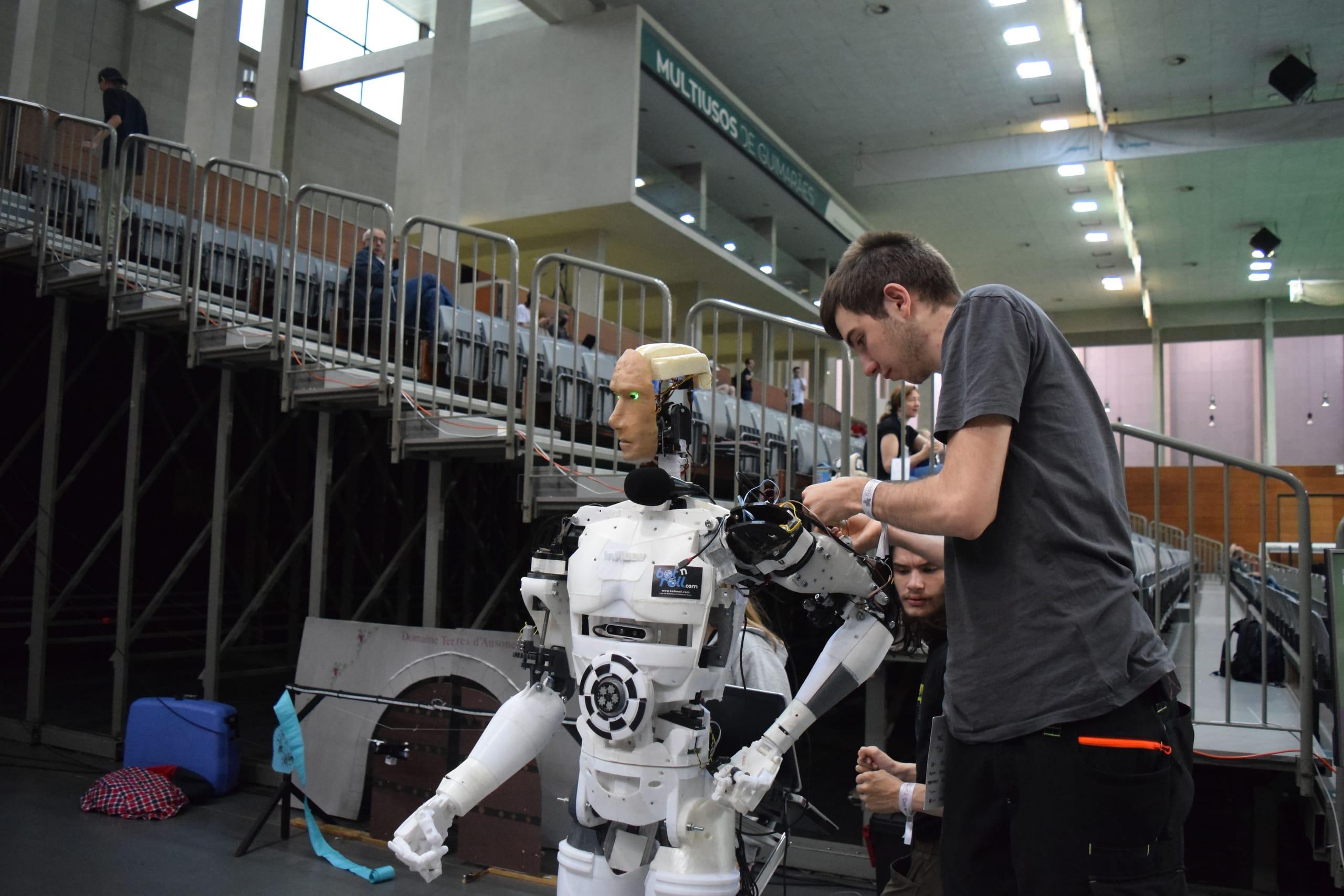 Engineers fine-tuning a joint assembly on our test floor.
