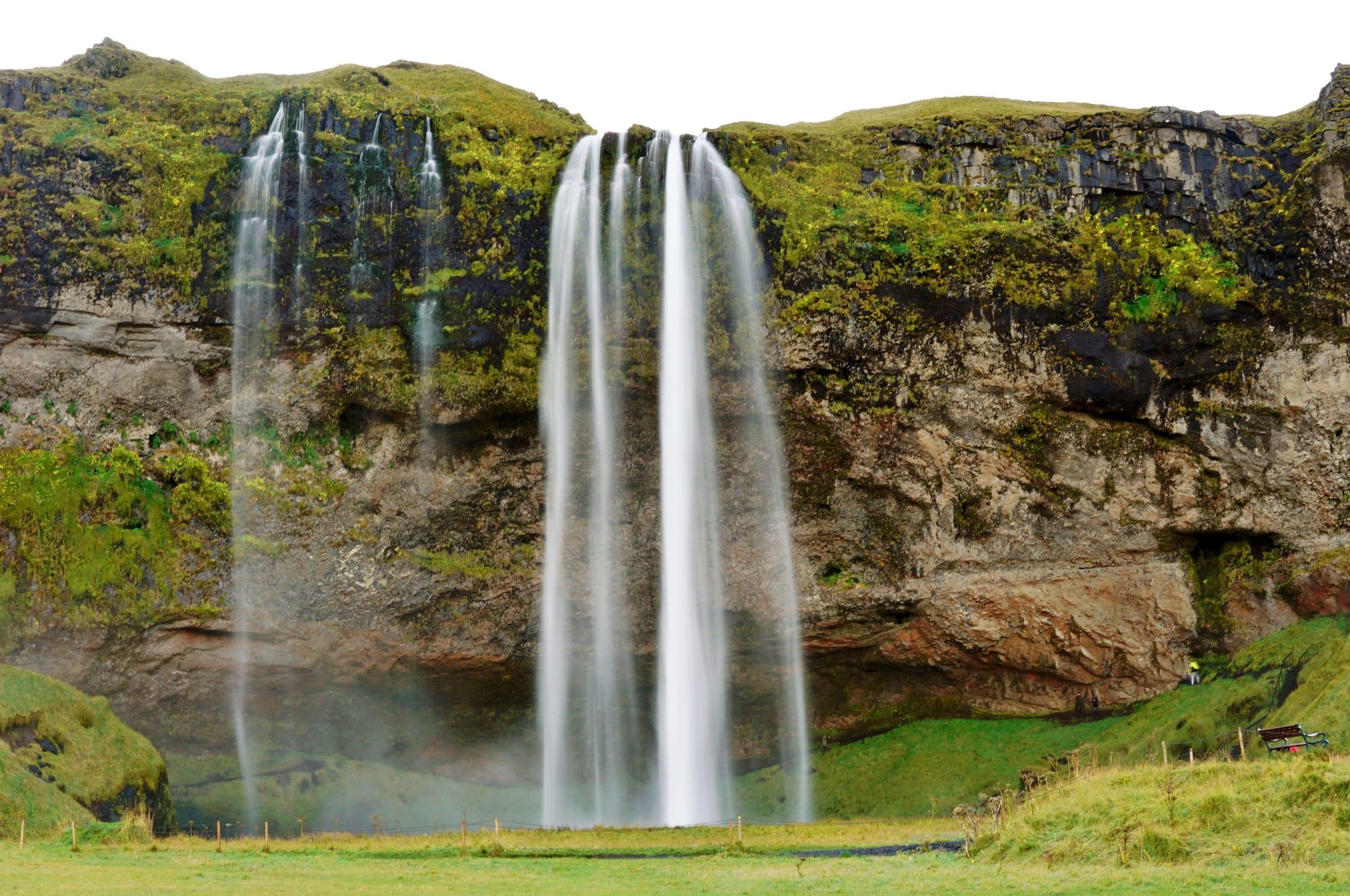 The view from the cave-like ledge behind the falls, looking out through the water.