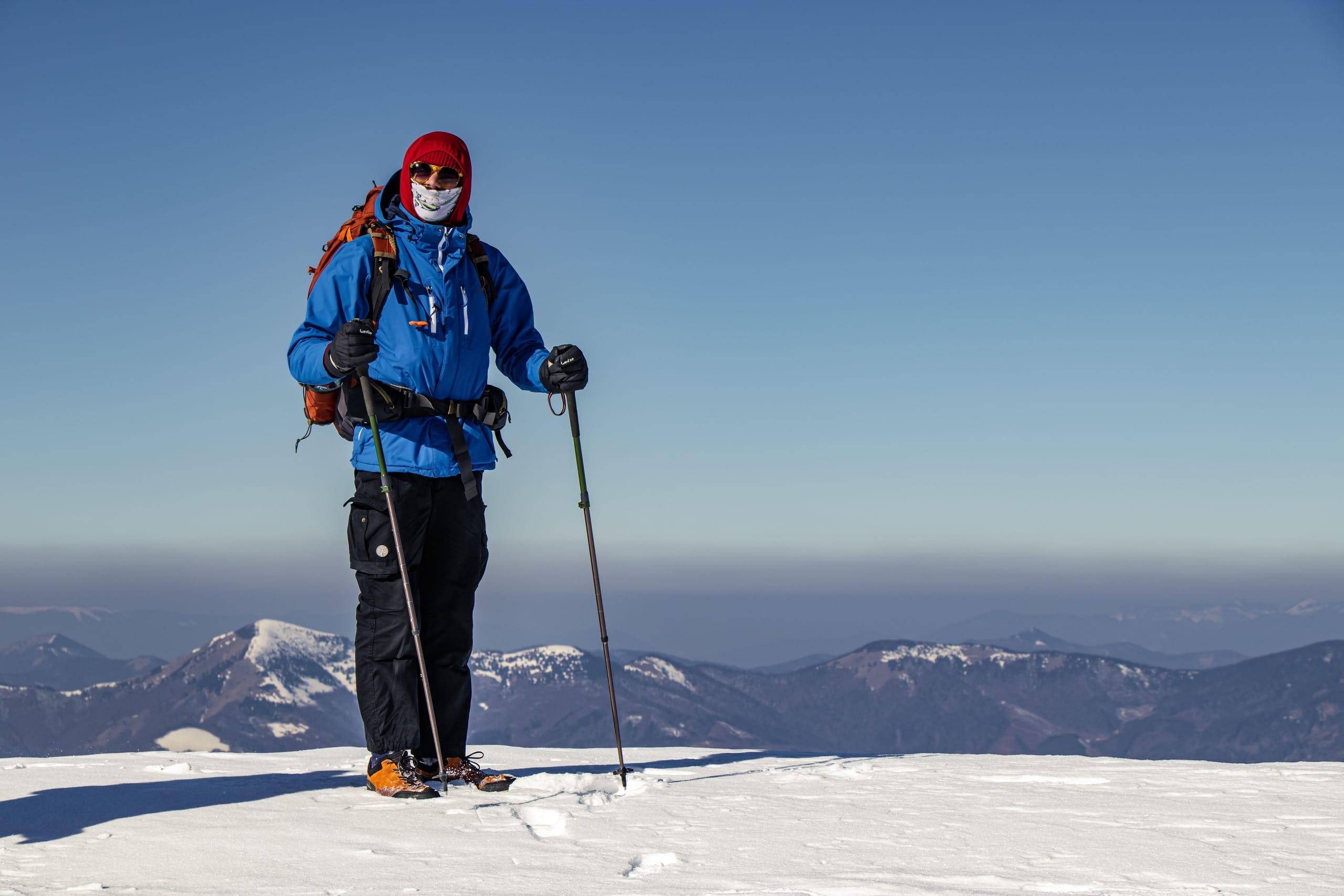 Reaching the summit ridge just as the cloud layer broke below us.